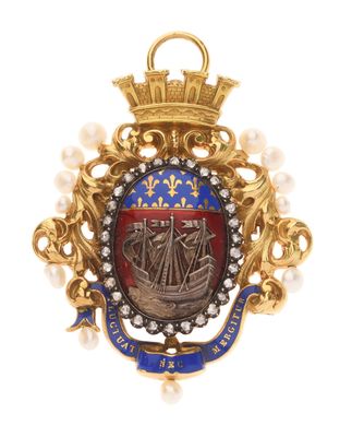 un gros plan d'un insigne sur lequel figure un bateau
