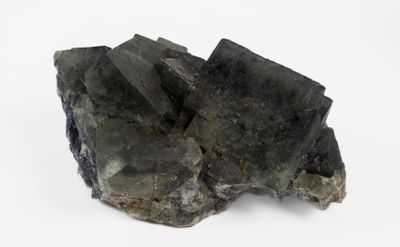 green tourmaline crystals on a white background