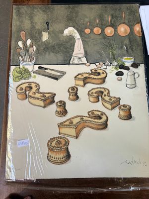 une photo d'une photo représentant une table sur laquelle se trouve un gâteau