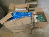 a pile of boxes that are sitting on the floor