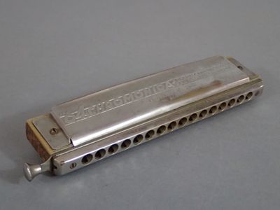 a harmonica that is sitting on a table