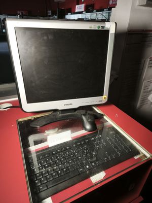 Écran PHILIPS , un clavier et une souris FUJITSU.