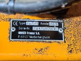 a close up of a sign on the side of a tractor