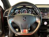 the interior of a car with a steering wheel and dashboard controls
