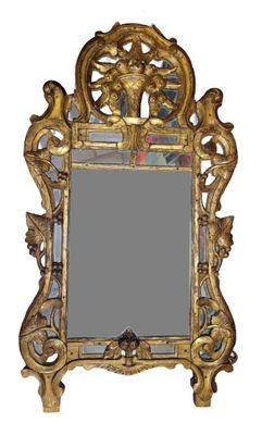 a mirror that is sitting on the wall