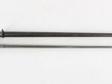 a close up of a pair of tools on a white surface