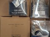 several packages of electronics are sitting in a box on a table