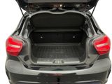 the back of a car with its trunk open showing the trunk space