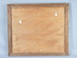 an old wooden picture frame with holes in the middle of it