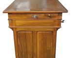 an image of a wooden cabinet with a drawer on top of it