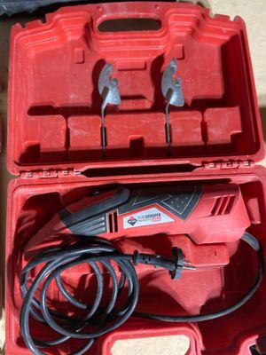 an image of a red tool box with tools in it
