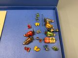 a blue box with a bunch of small toys in it