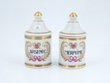 pair of white and gold ceramic salt and pepper shakers