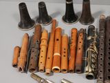 a lot of musical instruments that are sitting on a table