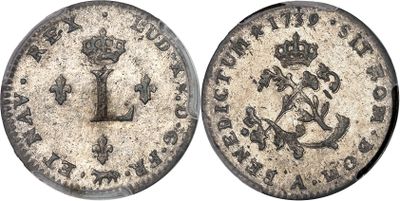 une pièce d'argent avec une couronne au recto et une couronne au verso