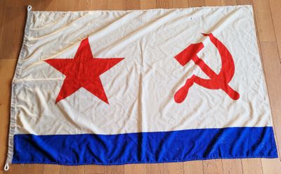 an image of a flag with a hammer and star on it