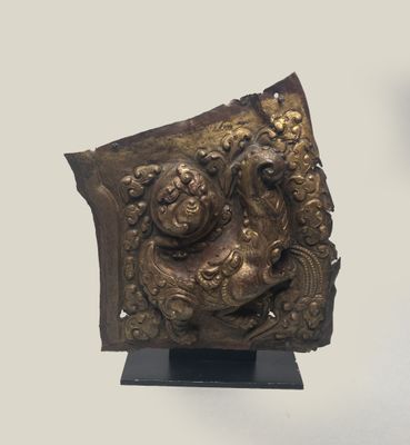 a bronze sculpture of a man and a woman on a pedestal