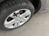 a close up of a tire on a car ' s rim