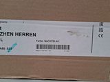 a box with a label on it that says jacket shezenn herr