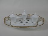 an image of a white and gold tea set on a tray