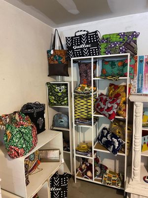 a room with a lot of bags and bags on the shelves