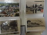 several old black and white photos of a city in a book
