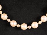 a close up of a necklace on a mannequin mannequin mannequin mannequin mannequin mannequin mannequin mannequin
