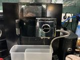 a coffee machine that is sitting on a counter