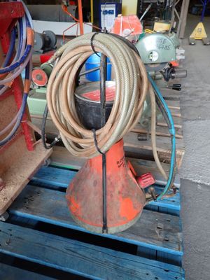 a hose on a pallet next to a fire hydrant on a pallet