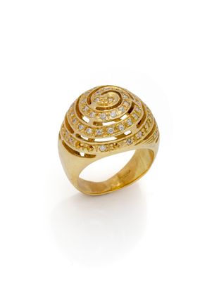 a gold ring with diamonds on a white background