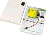 an image of a white electronic device sitting on top of a white surface