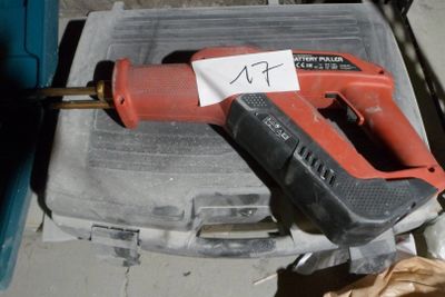 an image of a cordless drill with a tag on it