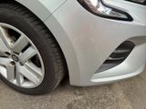 a close up of a car ' s front wheel and tire