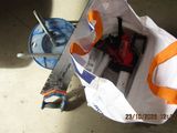 a bag with tools in it sitting on the floor