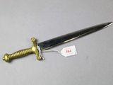 a small knife on a table with a price tag