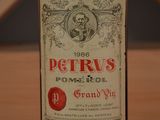 a close up of a bottle of wine on a table