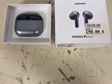 an image of a box with a pair of earphones in it