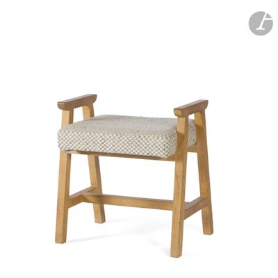 the back of a wooden bench with a seat made of fabric