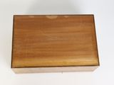 an image of a wooden box on a white surface