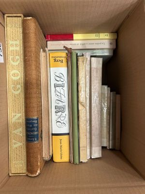a box full of books that are sitting on a table