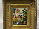 un tableau représentant une route bordée d'arbres et de buissons, dans un cadre doré