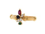 une image représentant une bague en or sertie de pierres multicolores
