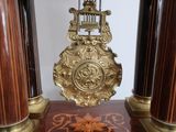 a clock that is sitting on top of a table