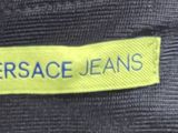 a close up of a label on a jacket that says versace jeans