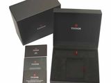 the box is open and the watch is in it ' s packaging