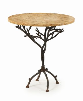 a small table with a tree design on top of it