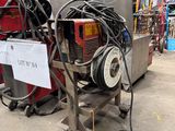 a machine that is sitting in the middle of a warehouse