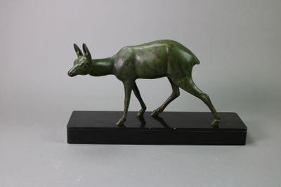 bronze statue of a deer on a black base