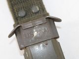 a close up of a belt with a metal buckle