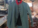 a blue jacket on a mannequin in a shop